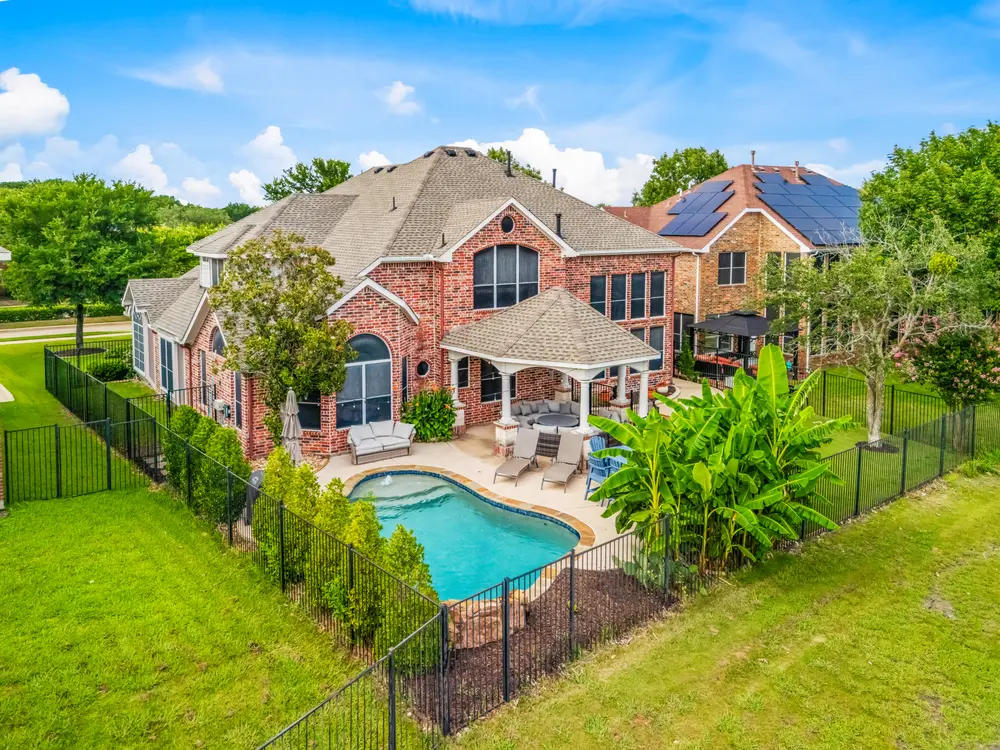 Aerial view of estate and pool