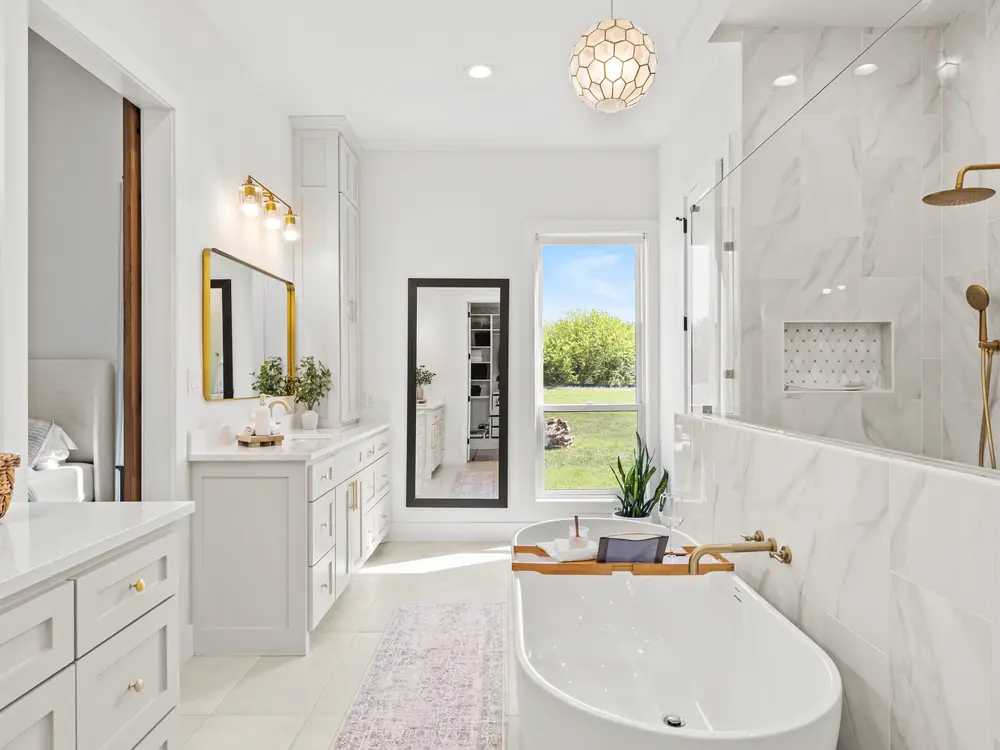 Marble bath with brass fixtures